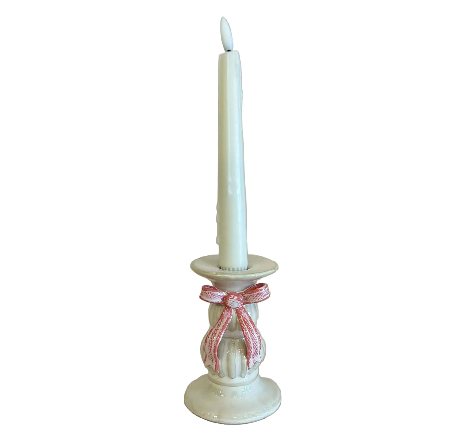 Candle holder with a white candle 