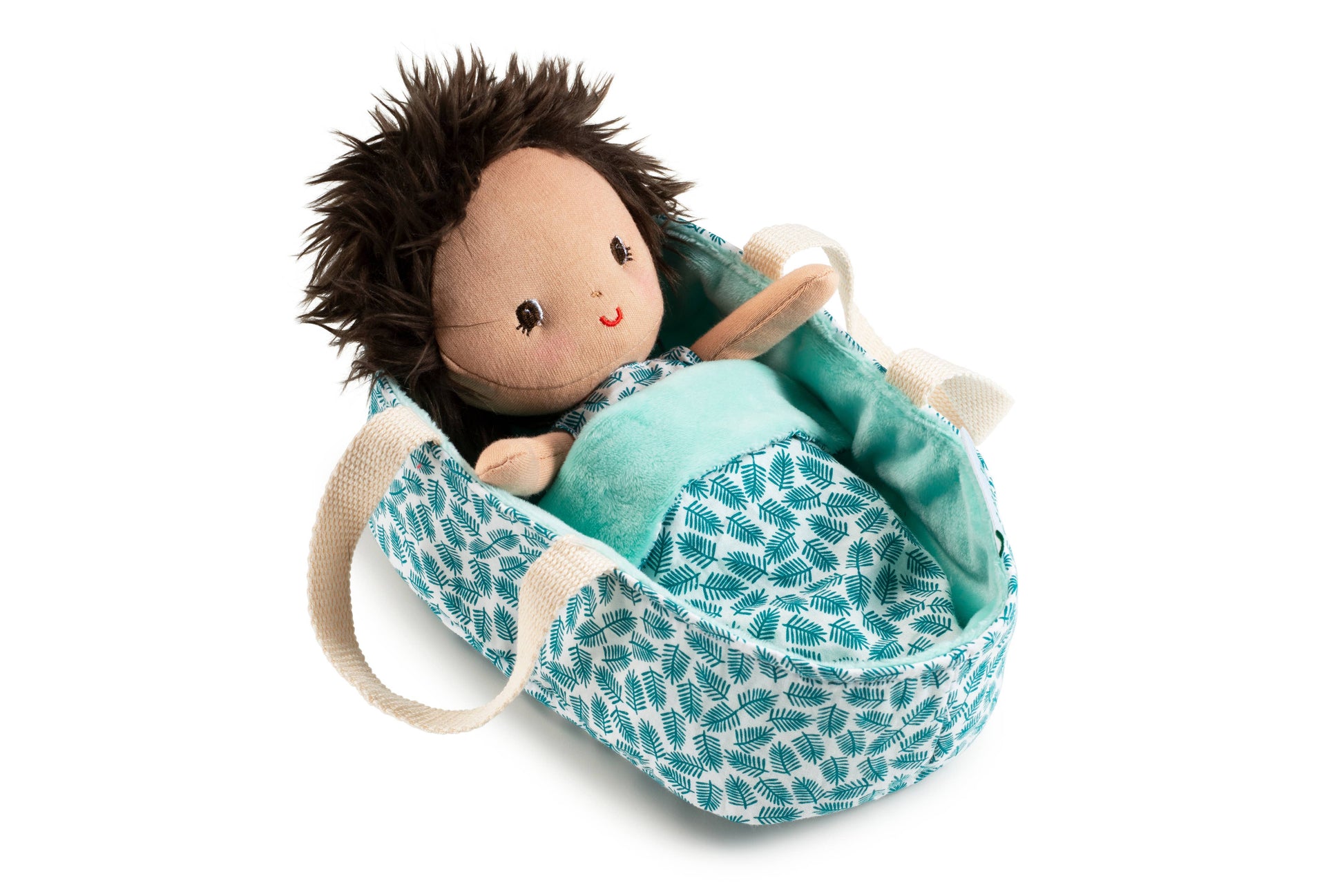 Plush doll in a teal patterned bag on a white background