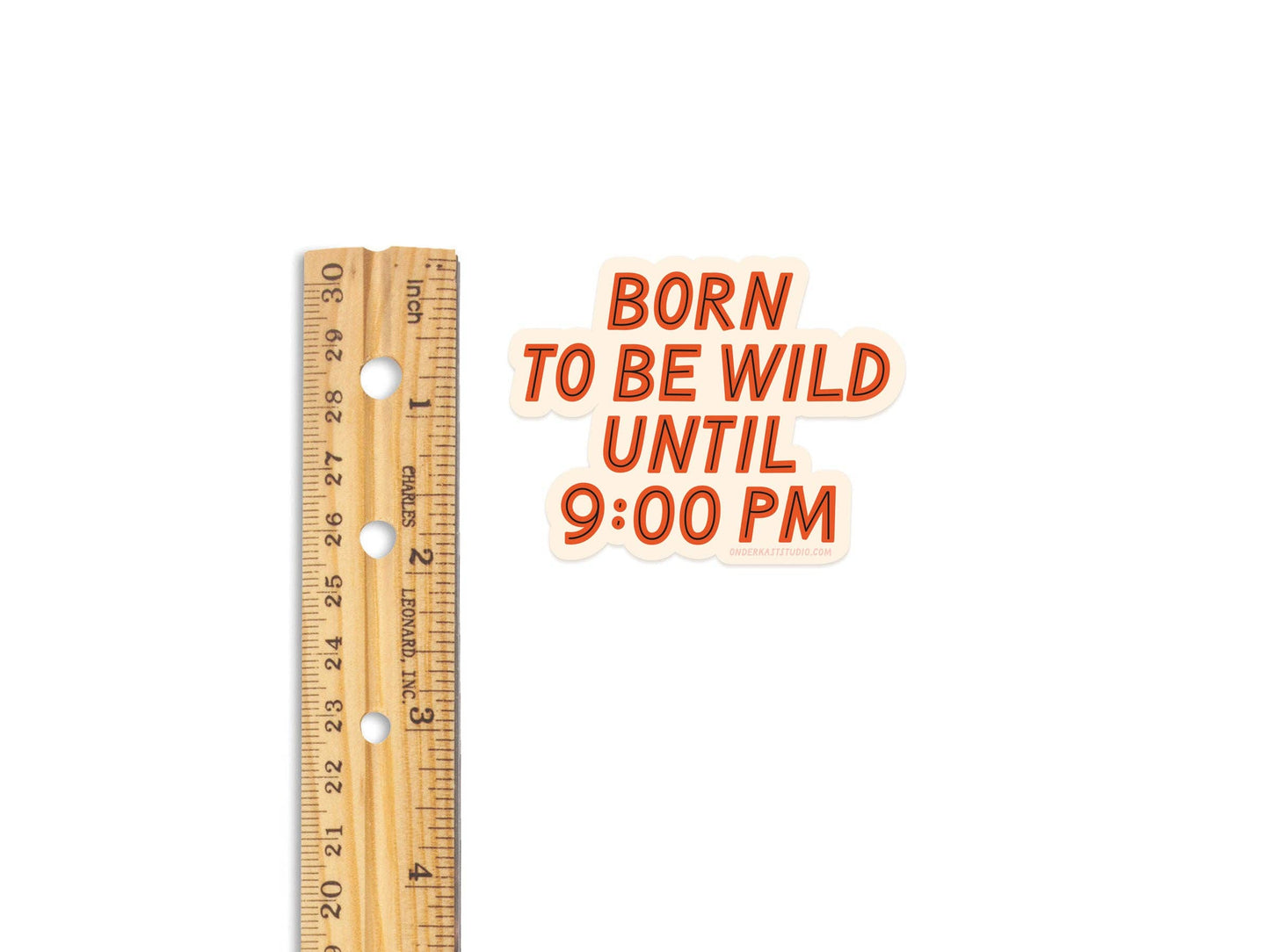 Wooden ruler next to a sign with text on a white background