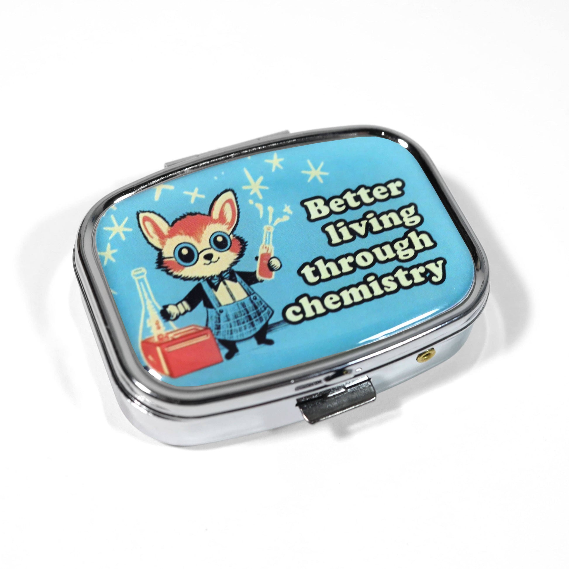 Compact mirror with cartoon character and 'Better living through chemistry' text on a blue background