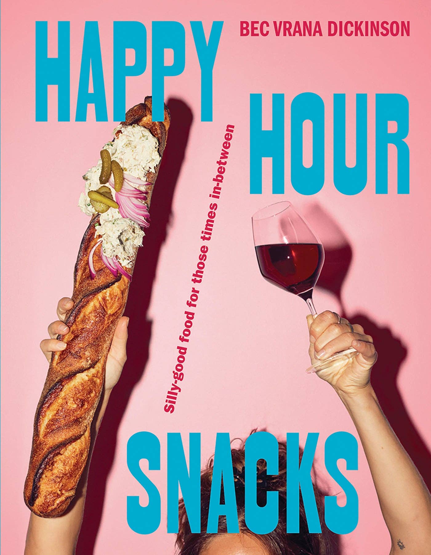 Book cover of 'Happy Hour Snacks' with a baguette and wine glass against a pink background