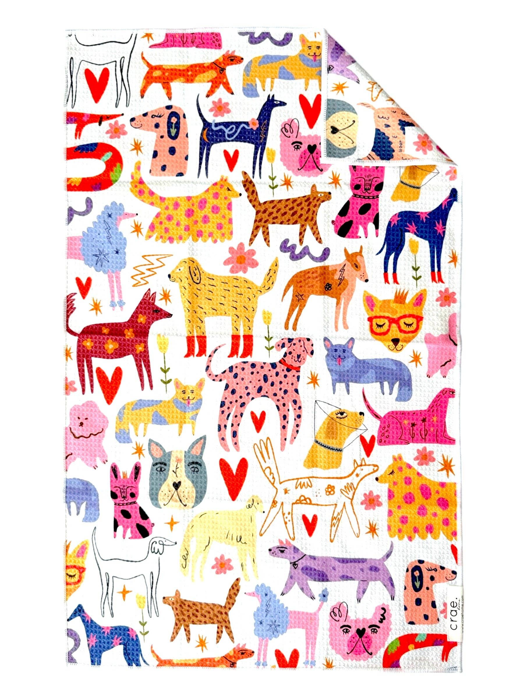 White tea towel with a colorful dog pattern 
