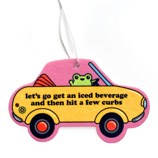 Car-shaped air freshener with a frog design and humorous text, "let's go get an iced beverage and then hit a few curbs" on a white background