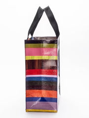 Colorful striped bag with a black strap on a white background