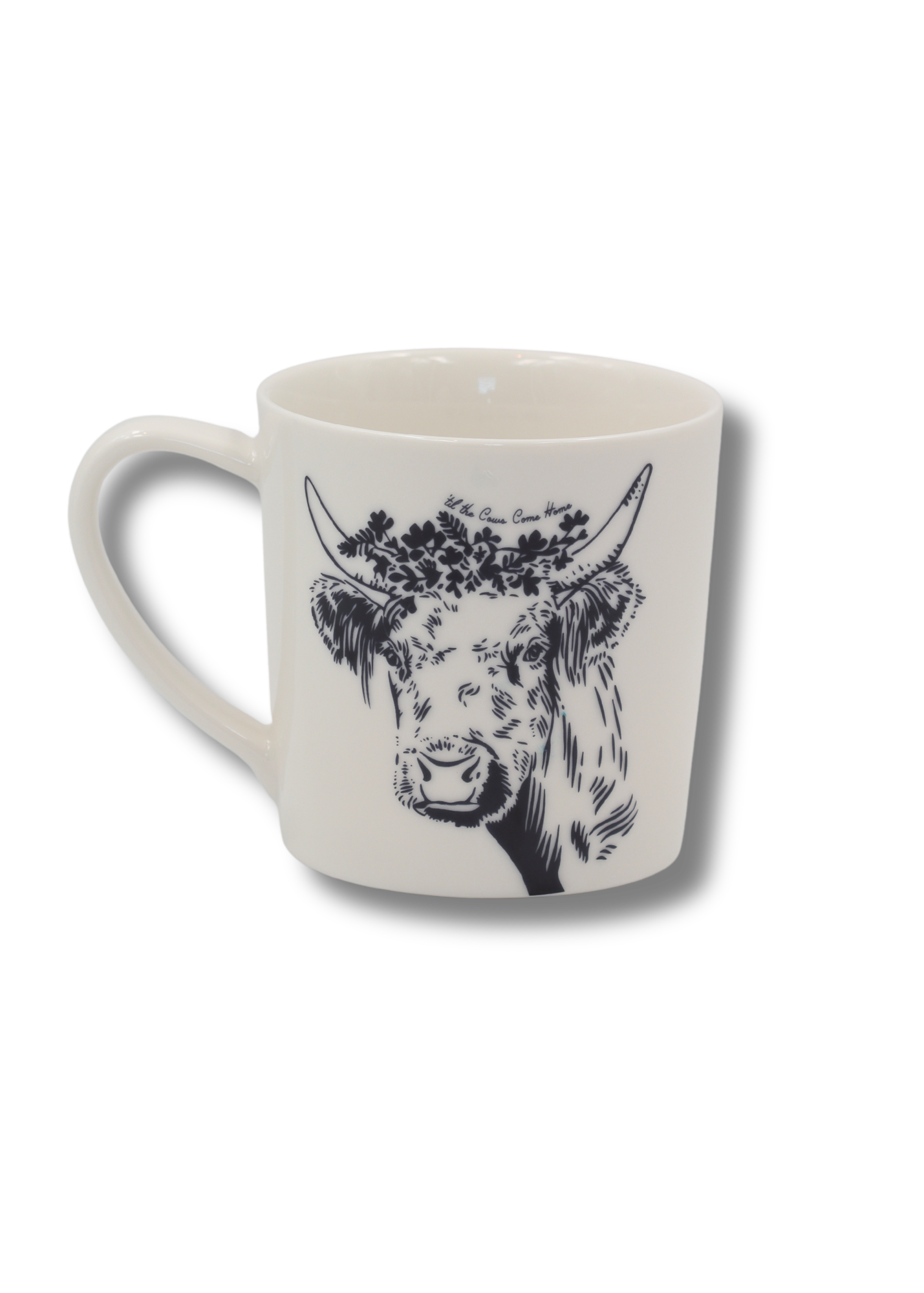 White mug with black highland cow design on a white background