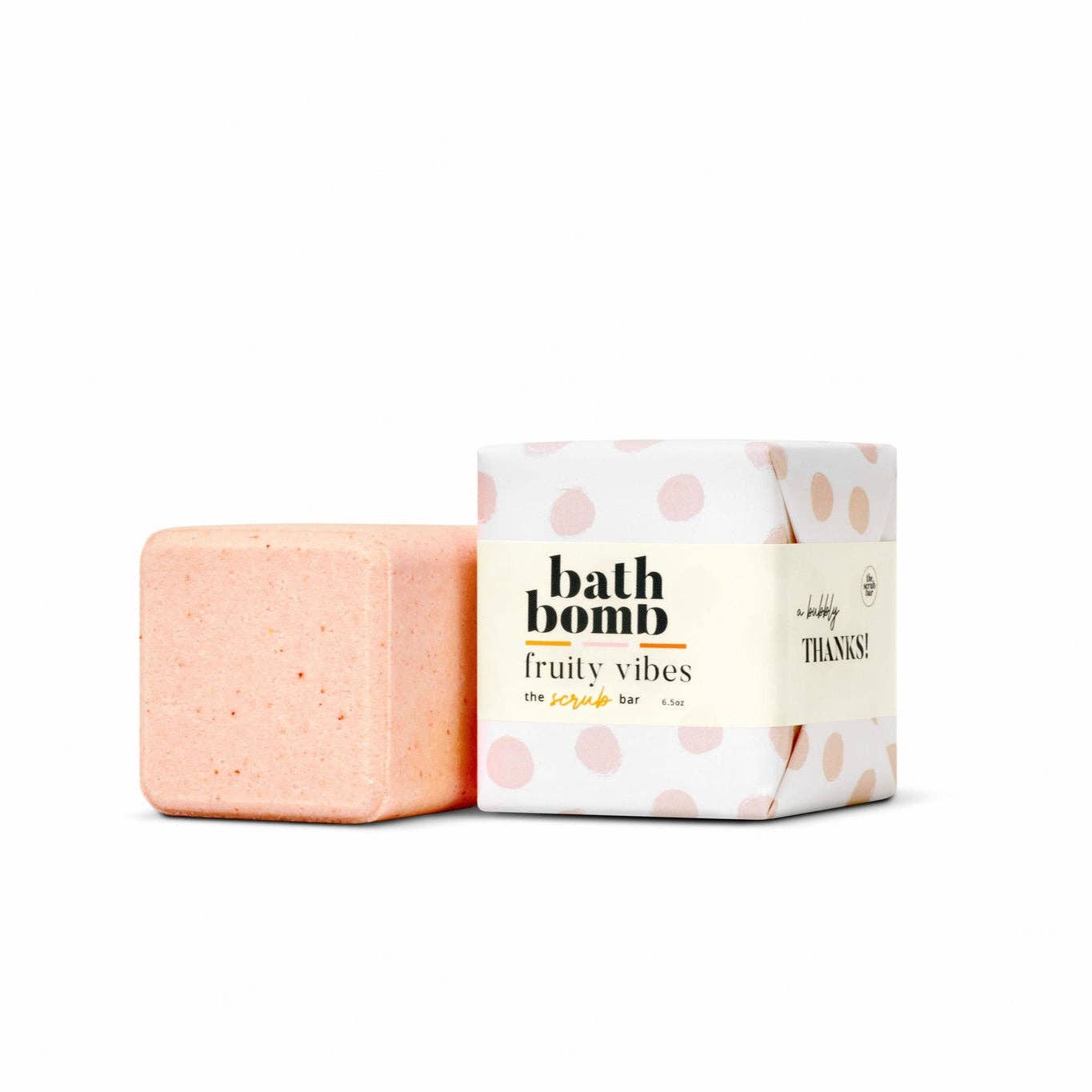 Pink bath bomb with baby pink polkadot packaging labeled 'bath bomb fruity vibes' on a white background