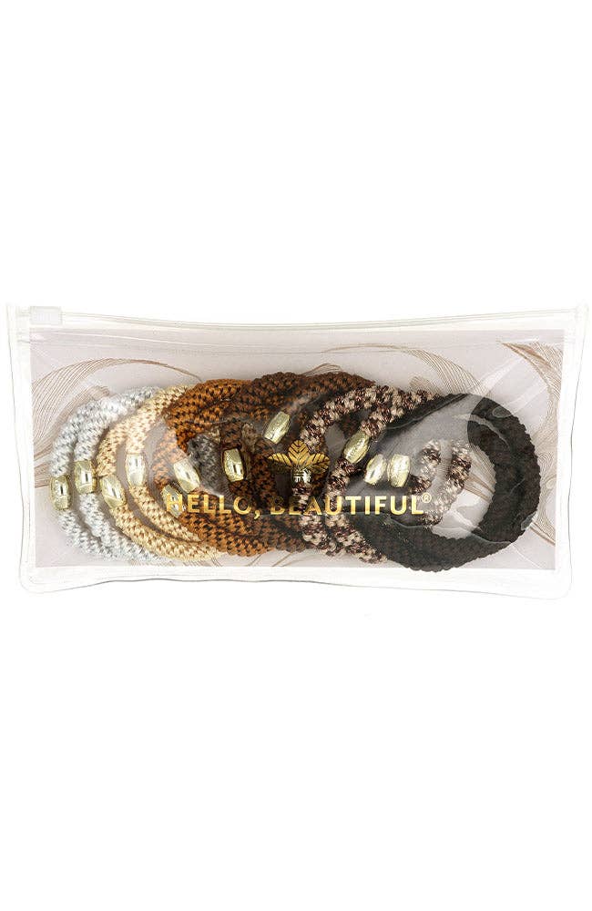 Set of decorative bracelets with 'Hello, Beautiful' text in a clear packaging on a white background