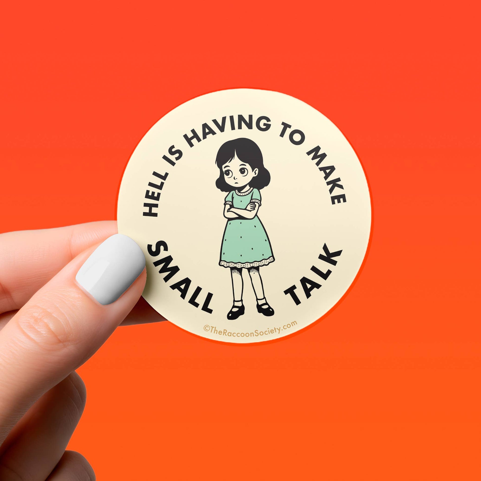 Circle sticker with a cartoon girl in blue dress and text that reads "Hell is having to make small talk" on a red background