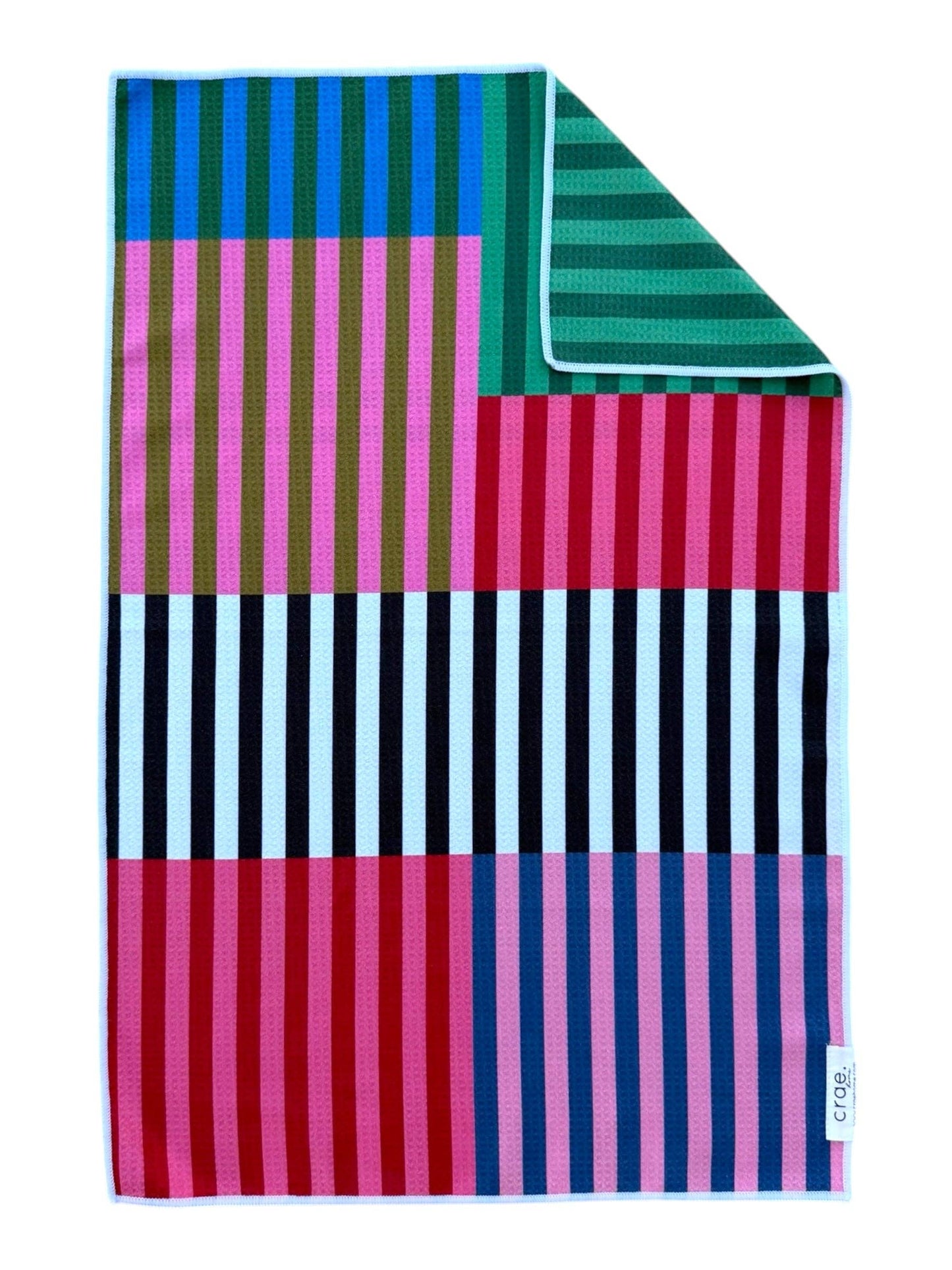 Colorful striped towel with geometric pattern on a white background