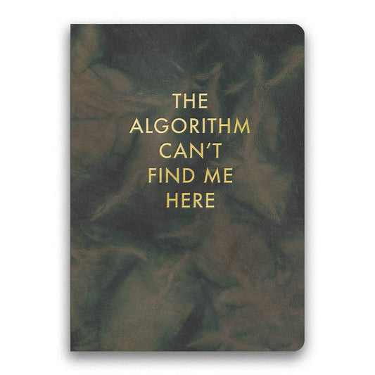 Notebook with text 'The Algorithm Can't Find Me Here' on a dark green background