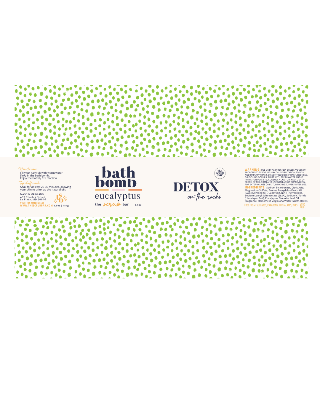 Bath bomb packaging with green polka dots and text on a white background