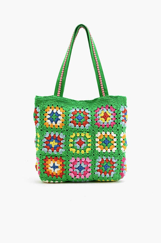 Colorful crochet bag with geometric pattern on a white background