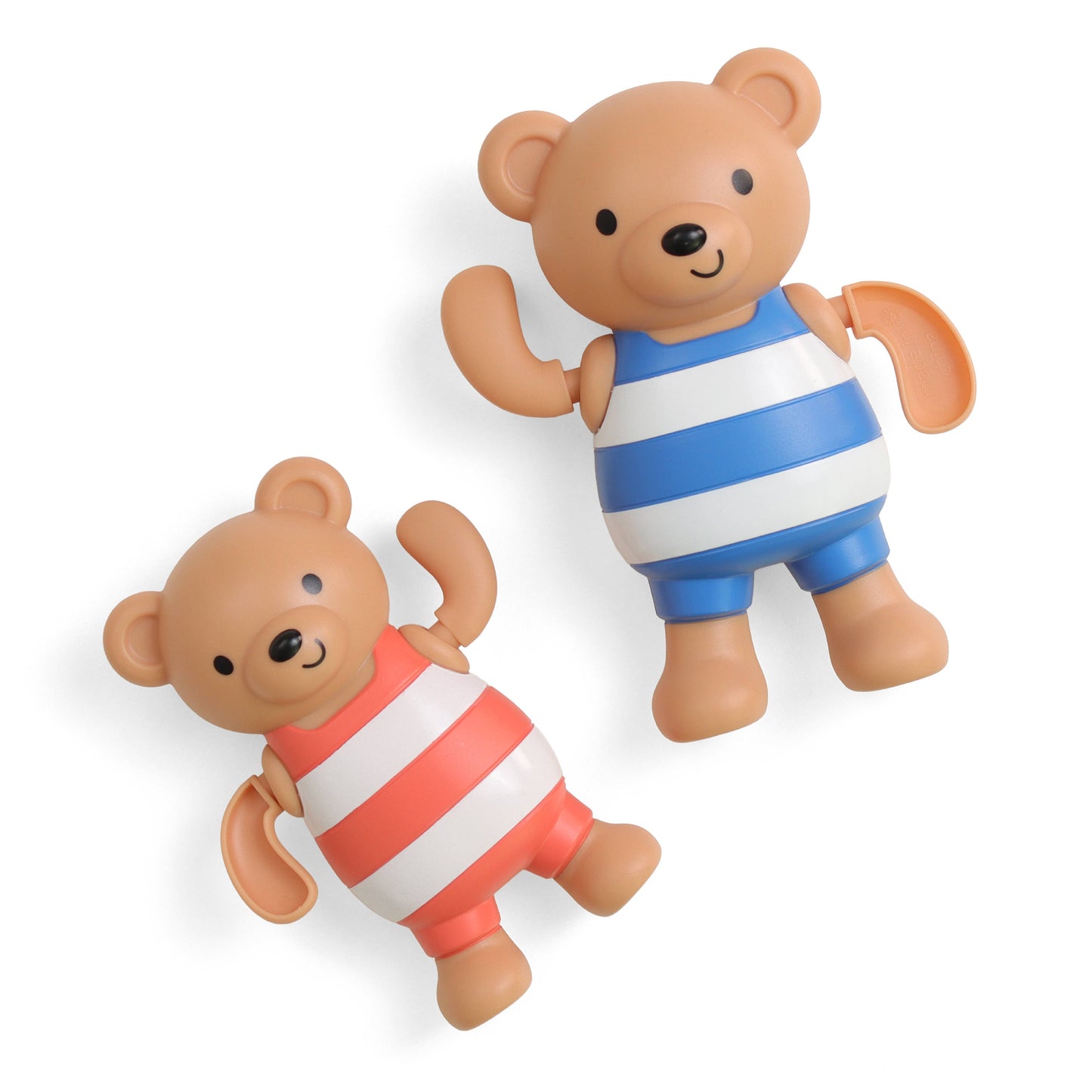Two teddy bear toys wearing striped shirts on a white background