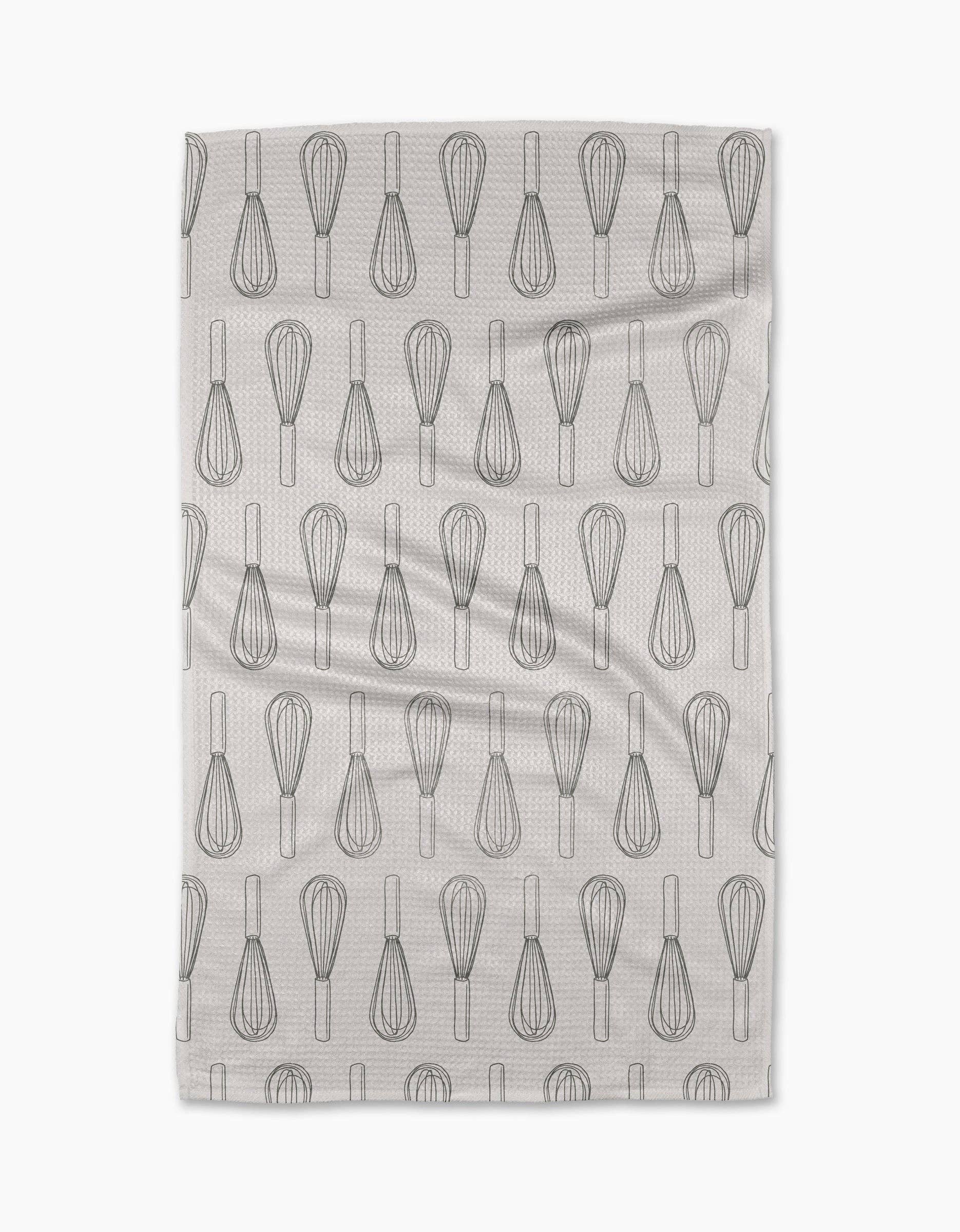 Tea towel with whisk pattern on a white background