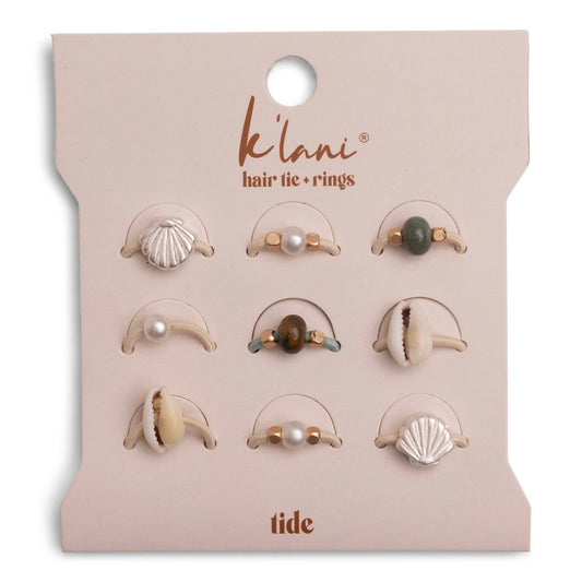 Set of hair tie rings on a 'klani' branded card with 'tide' text.