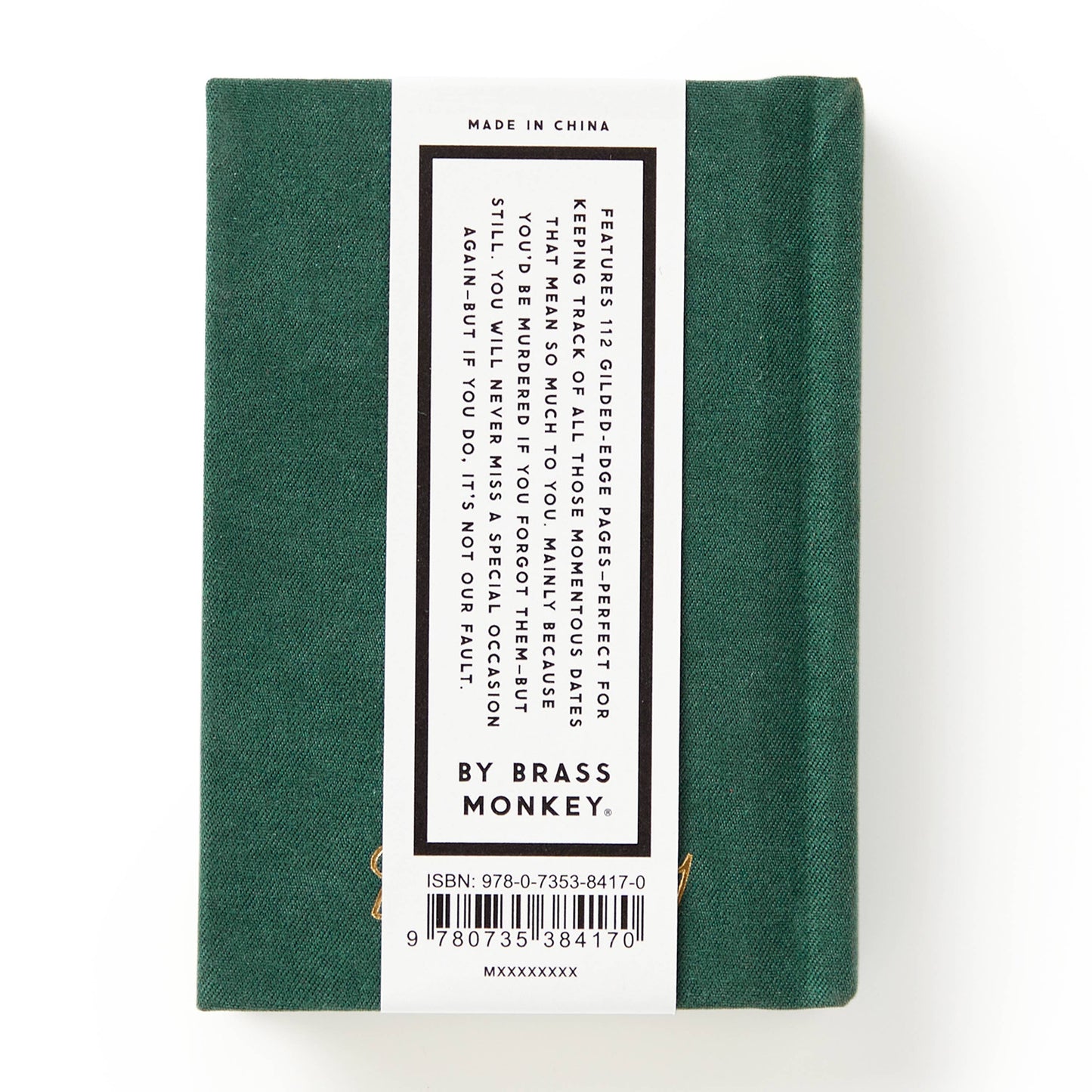 Green book with a label on a white background