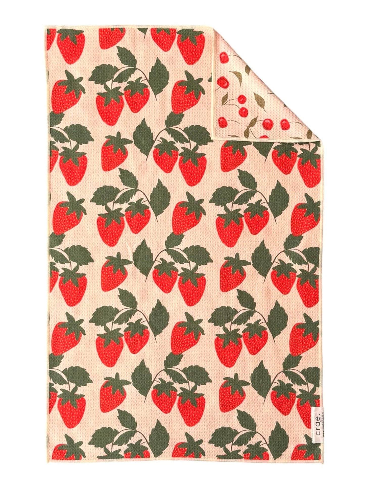 Fabric with strawberry pattern on a beige background