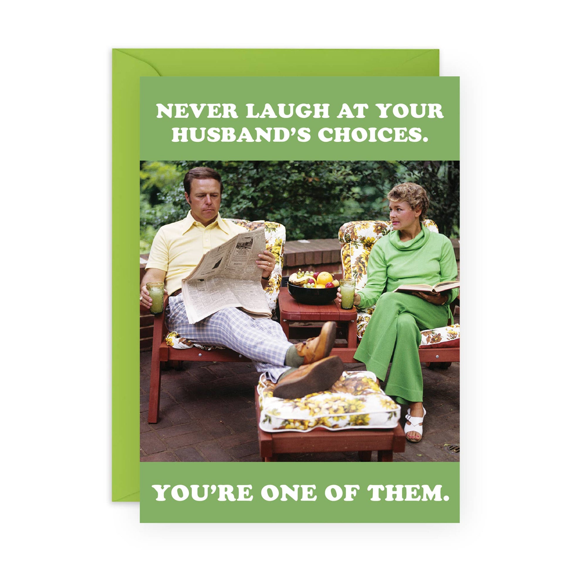 Card with a vintage-style photo of a man and woman sitting outdoors, with humorous text about not laughing at husband's choices.