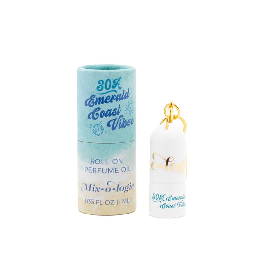 Roll-on perfume oil with packaging labeled '30A Emerald Coast Vibes' on a white background