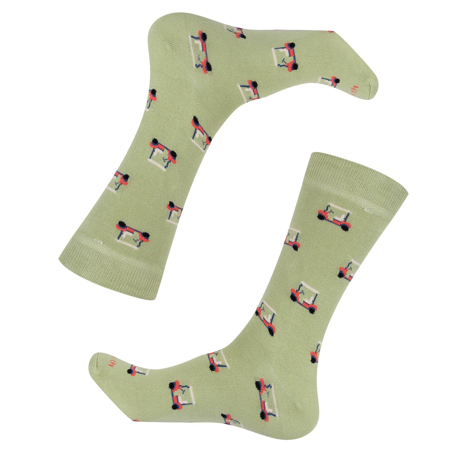 Green socks with small graphic patterns on a white background