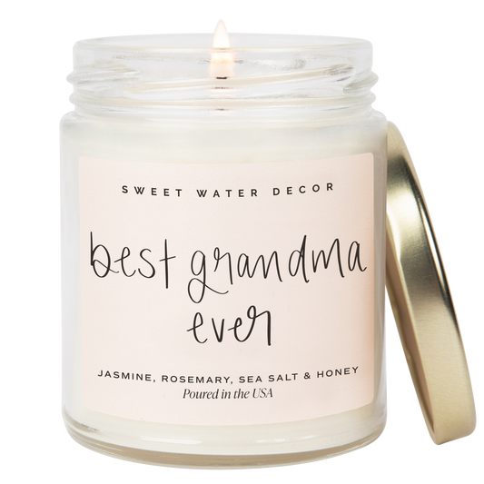 Candle in a jar with 'best grandma ever' text on the label, brand 'Sweet Water Decor' visible.