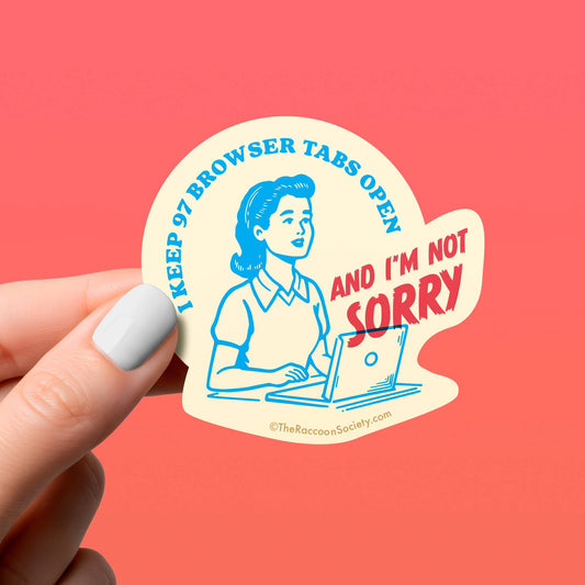 Sticker with a graphic of a person at a laptop and text 'I keep 97 browser tabs open and I'm not sorry' held by a hand against a pink background.
