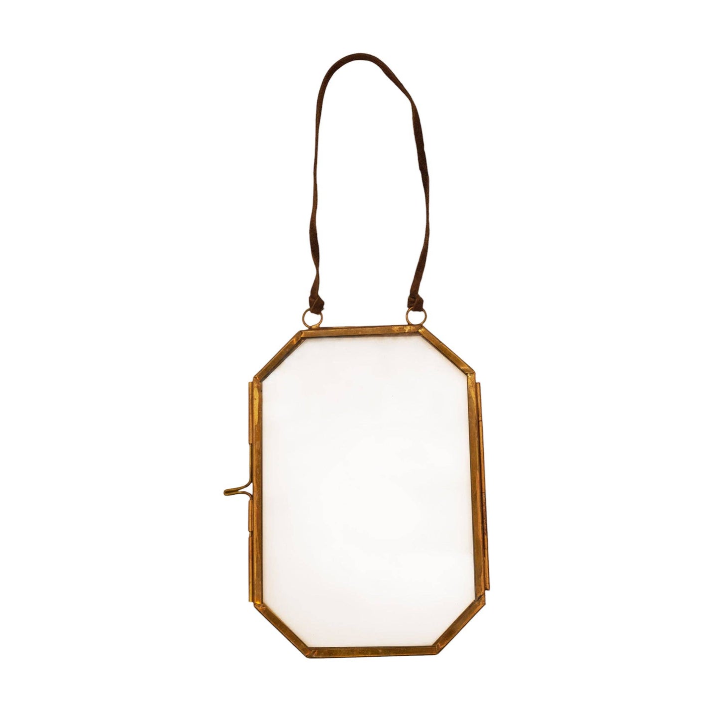 Decorative wall mirror with gold frame and white glass on a white background