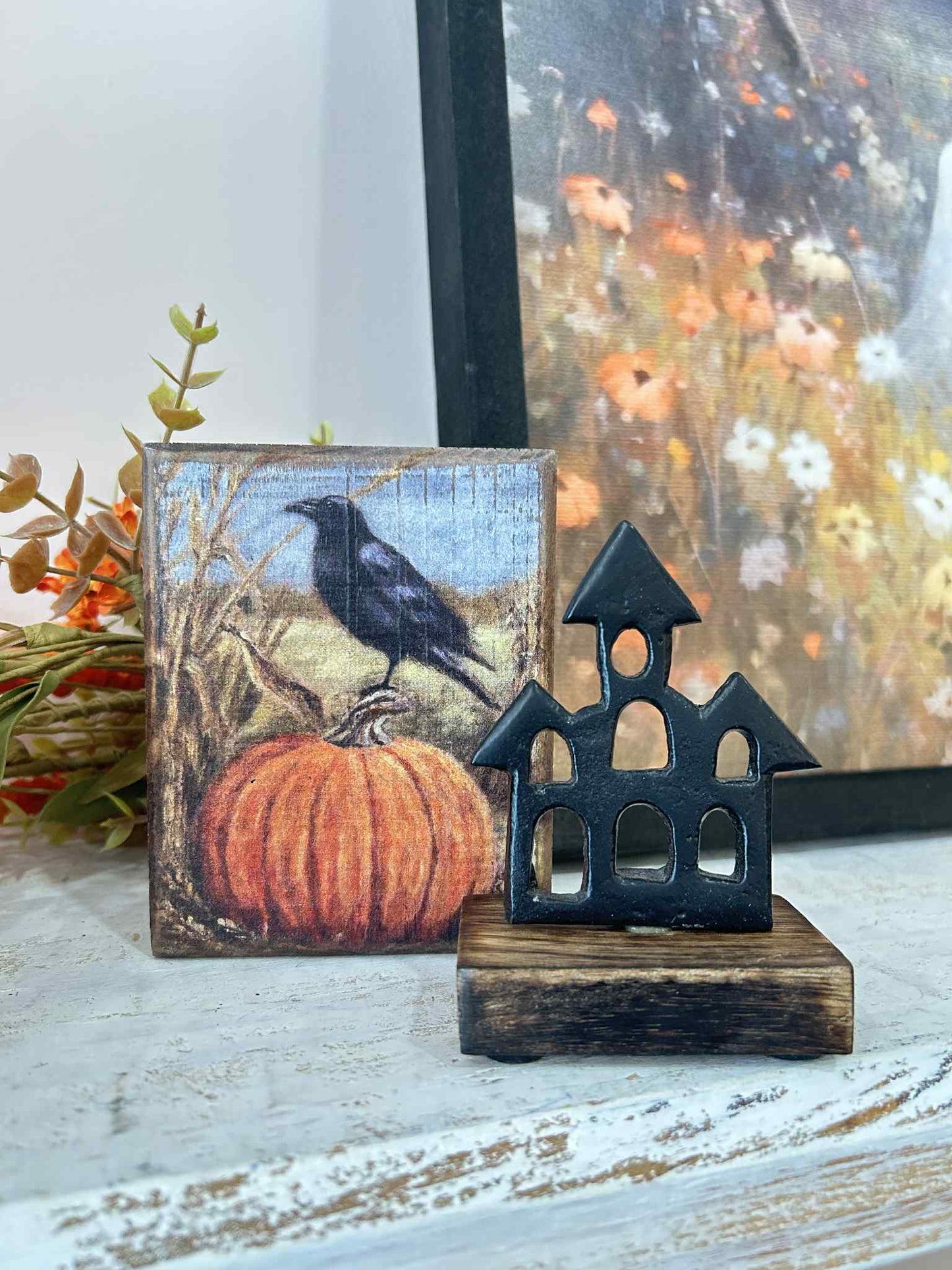 Small Black Metal House on Stand