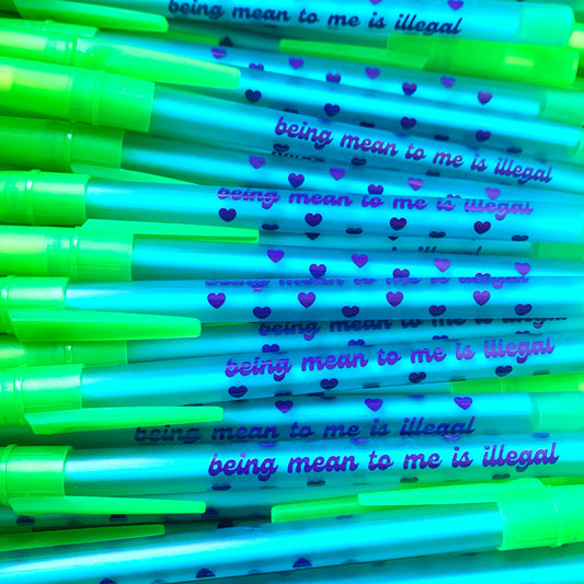 Neon green and blue straws with text and heart patterns