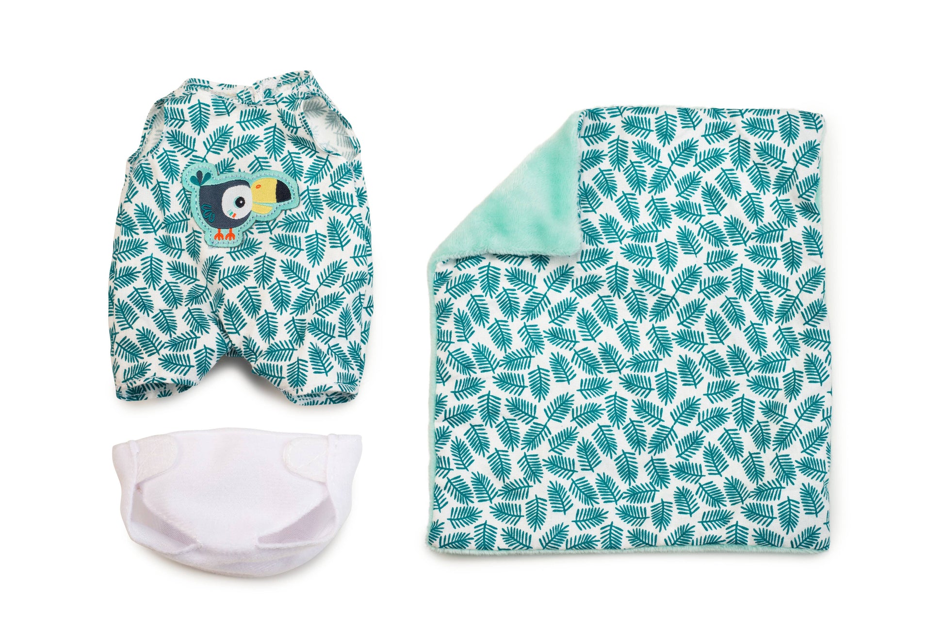 Baby hat, diaper, and blanket with leaf pattern on a white background