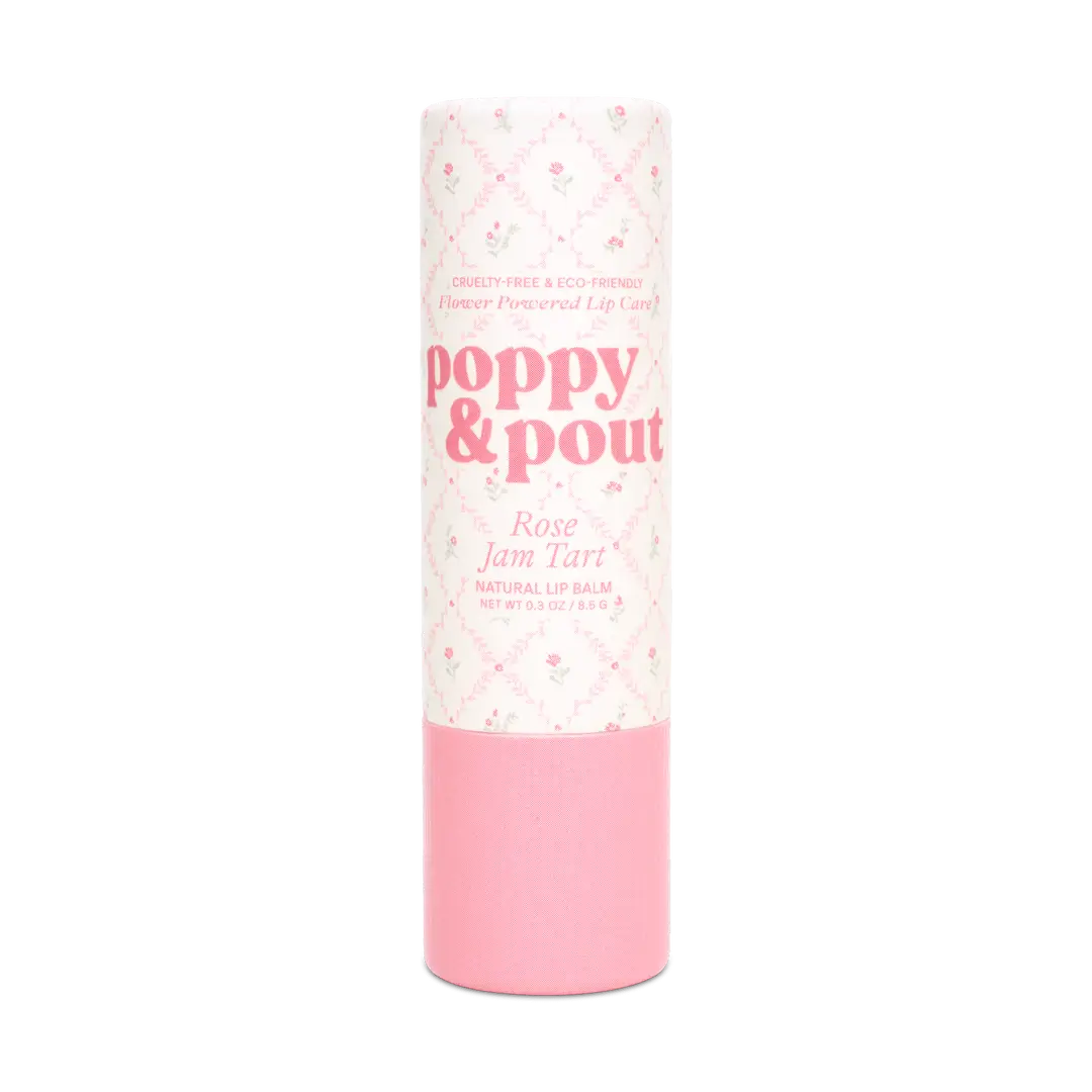 Pink lip balm tube with 'poppy & pout' branding on a white background