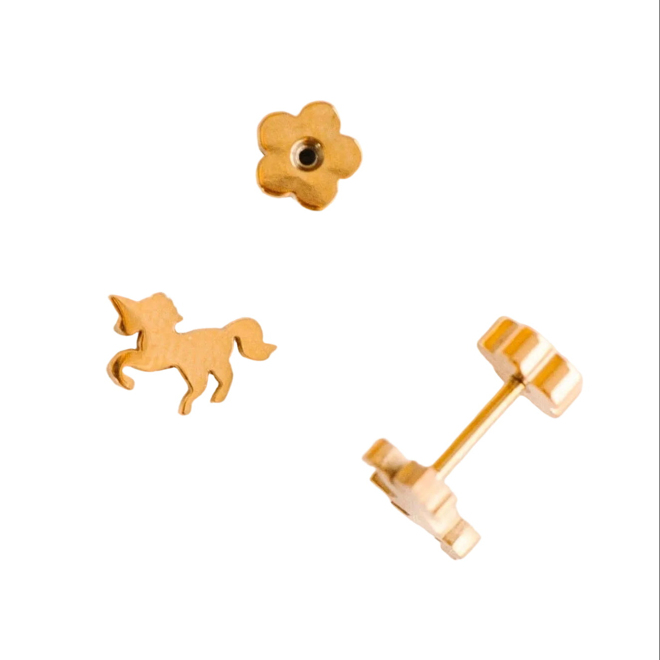 Gold unicorn-shaped stud earrings on a white background