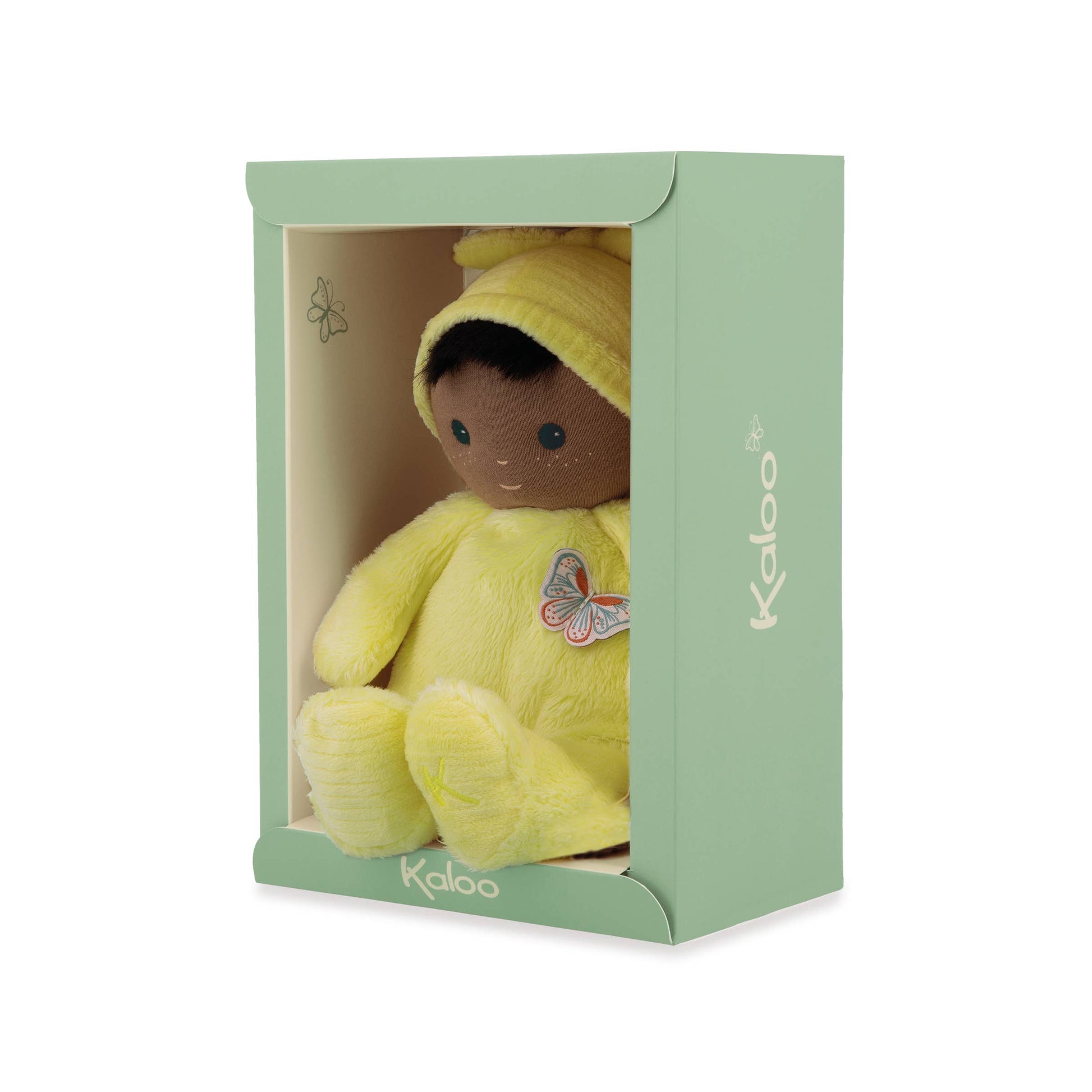 Yellow plush toy with a butterfly patch in a green box, branded 'Kaloo'.