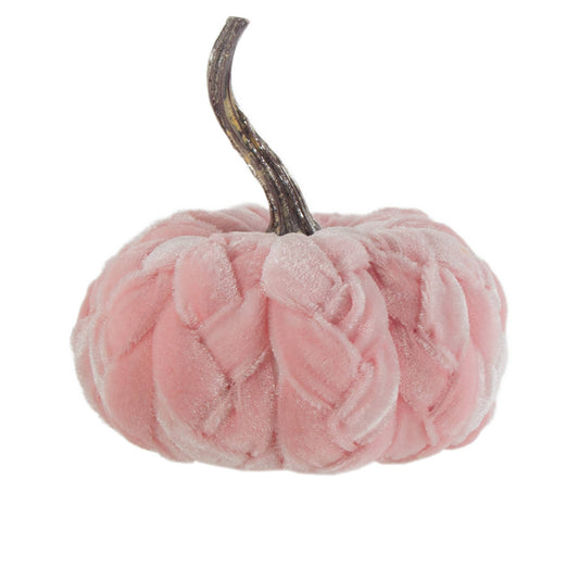 Pink velvet pumpkin with a brown stem on a white background
