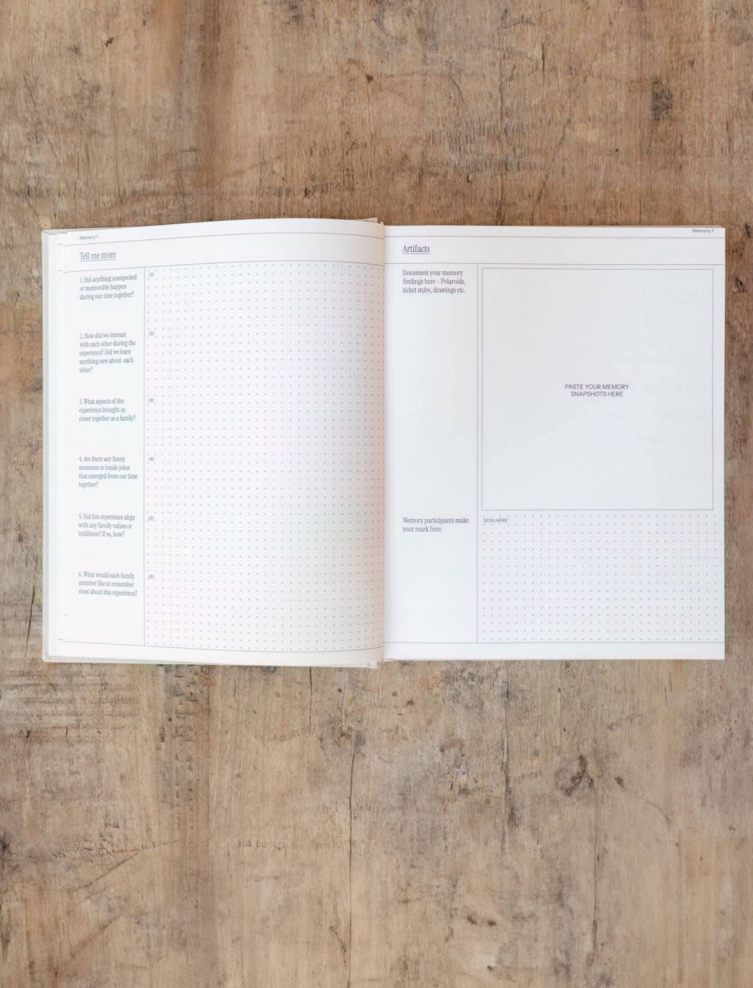 Open notebook on a wooden surface