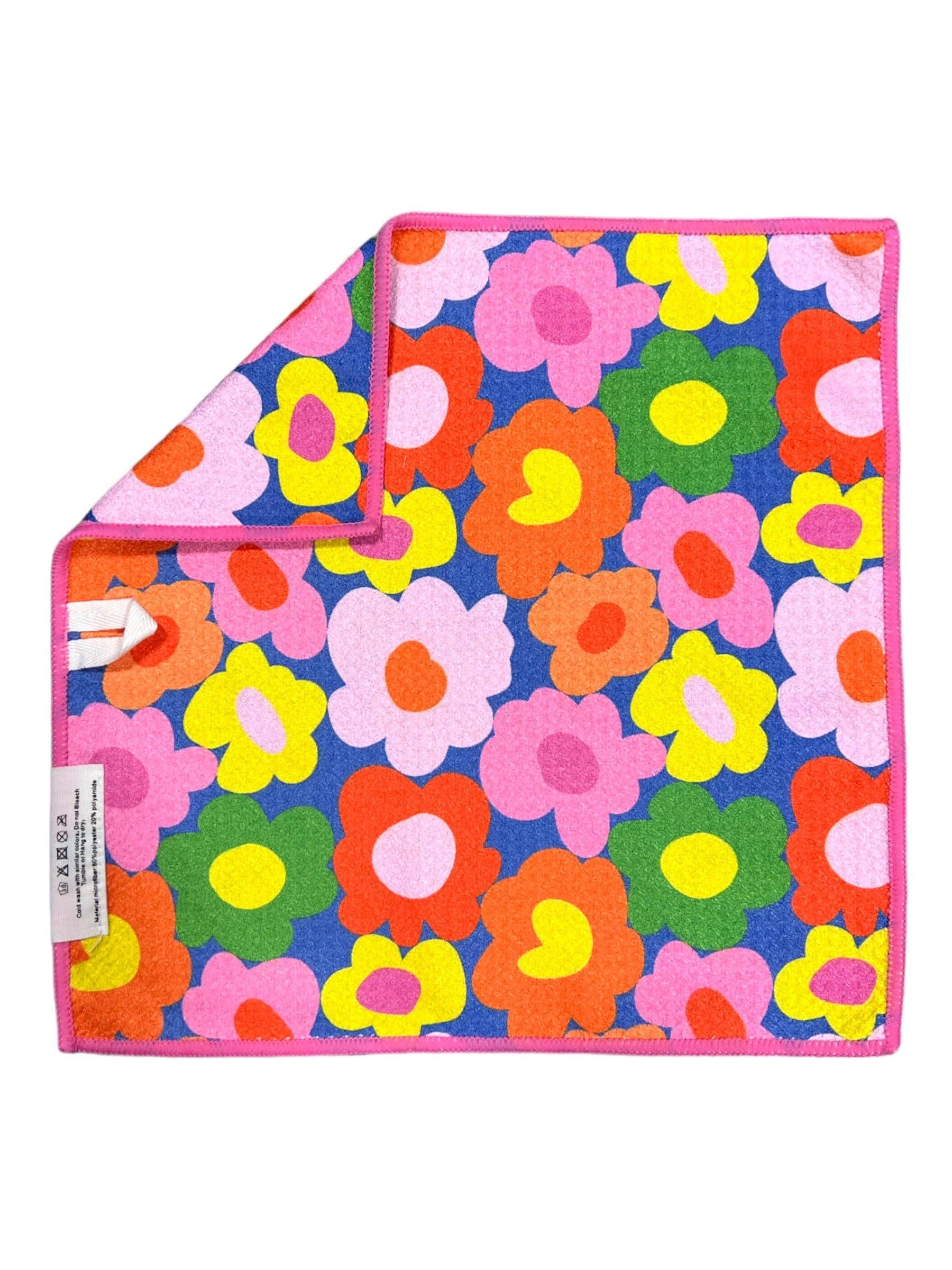 Colorful floral-patterned towel on a white background
