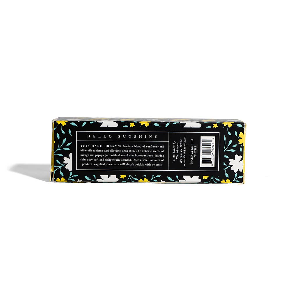 Hand cream packaging with floral design on a white background