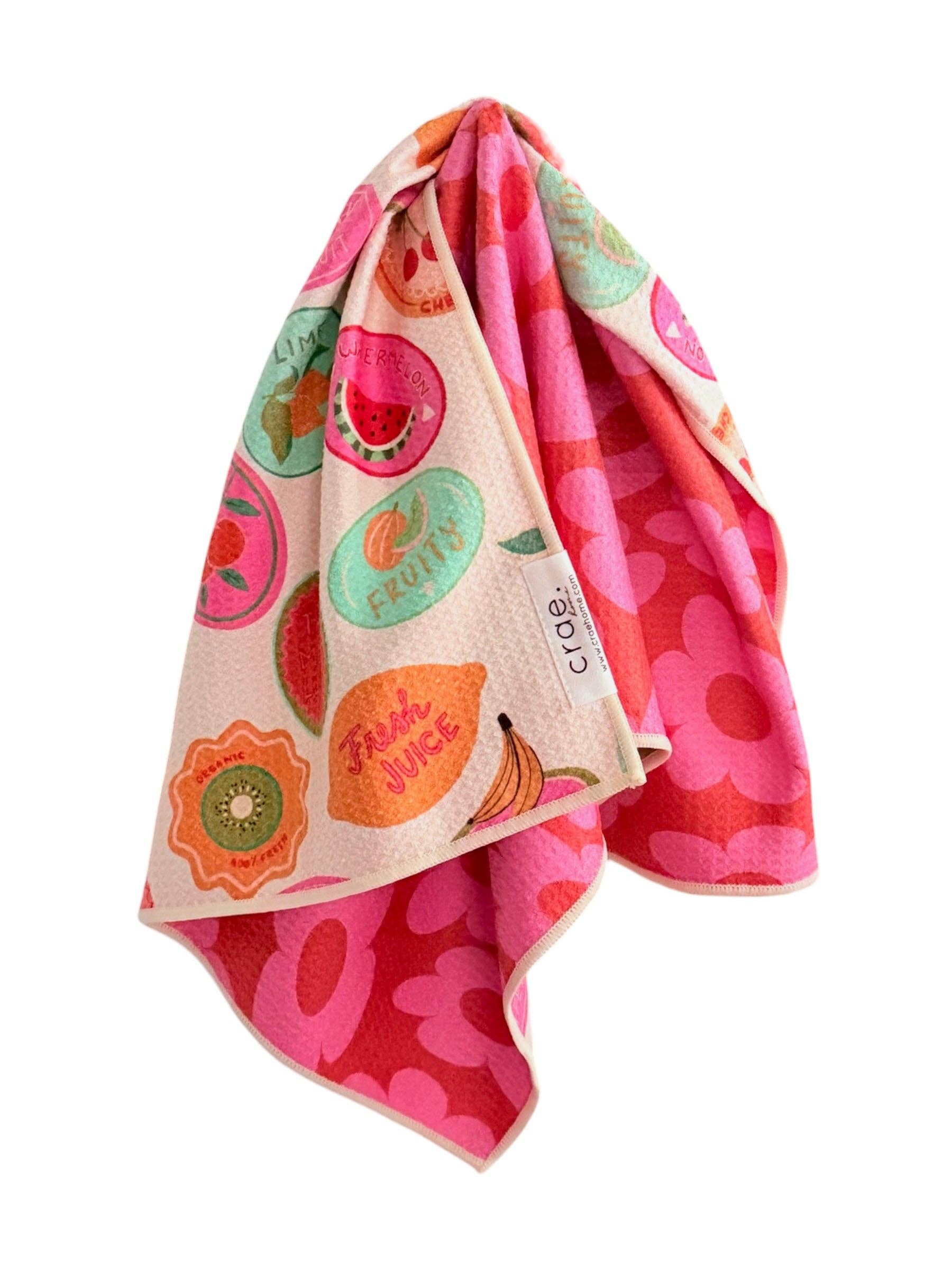 Colorful towel with fruit pattern on a white background