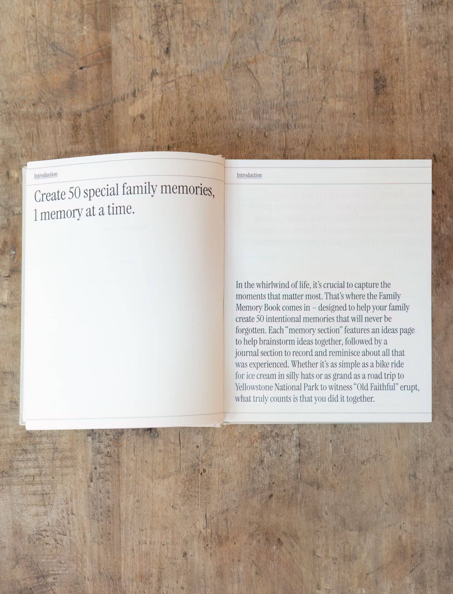 Open book on a wooden surface with text about creating special family memories.