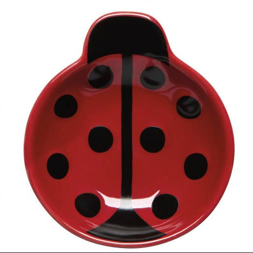 Maroon (dark red) bowl shaped like a lady bug on a white background