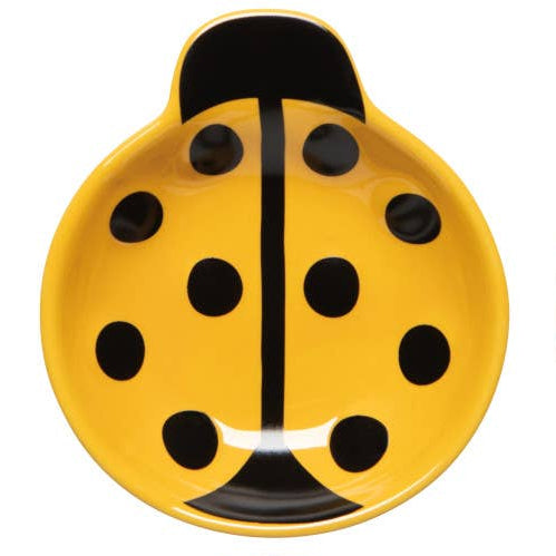 Yellow lady bug shaped bowl on a white background
