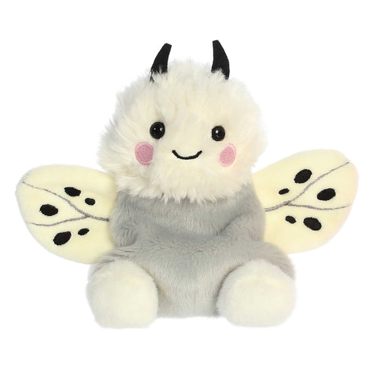 Plush toy moth with a white face and black antennae on a white background