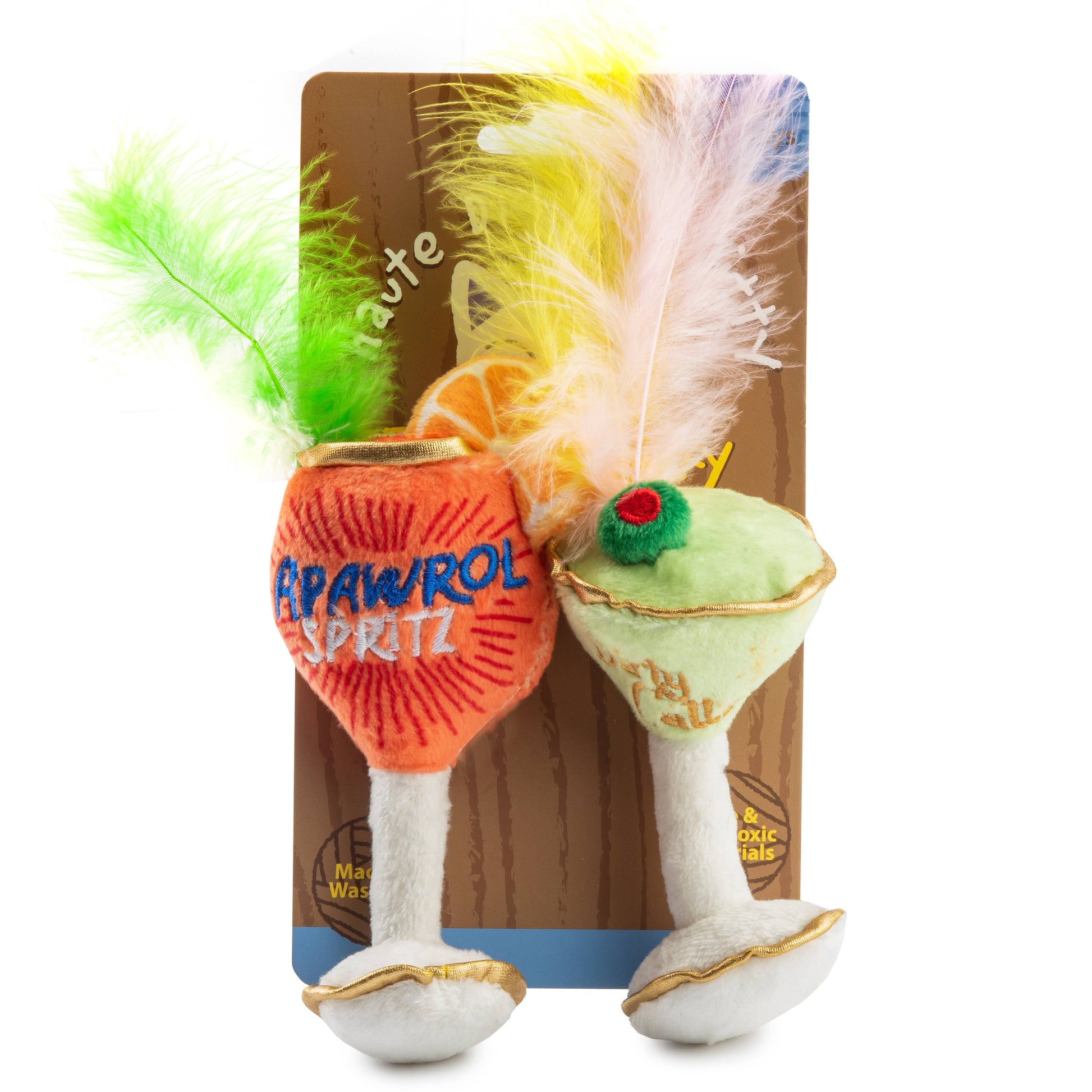 Toy resembling a cocktail with feathers and colorful text on a white background