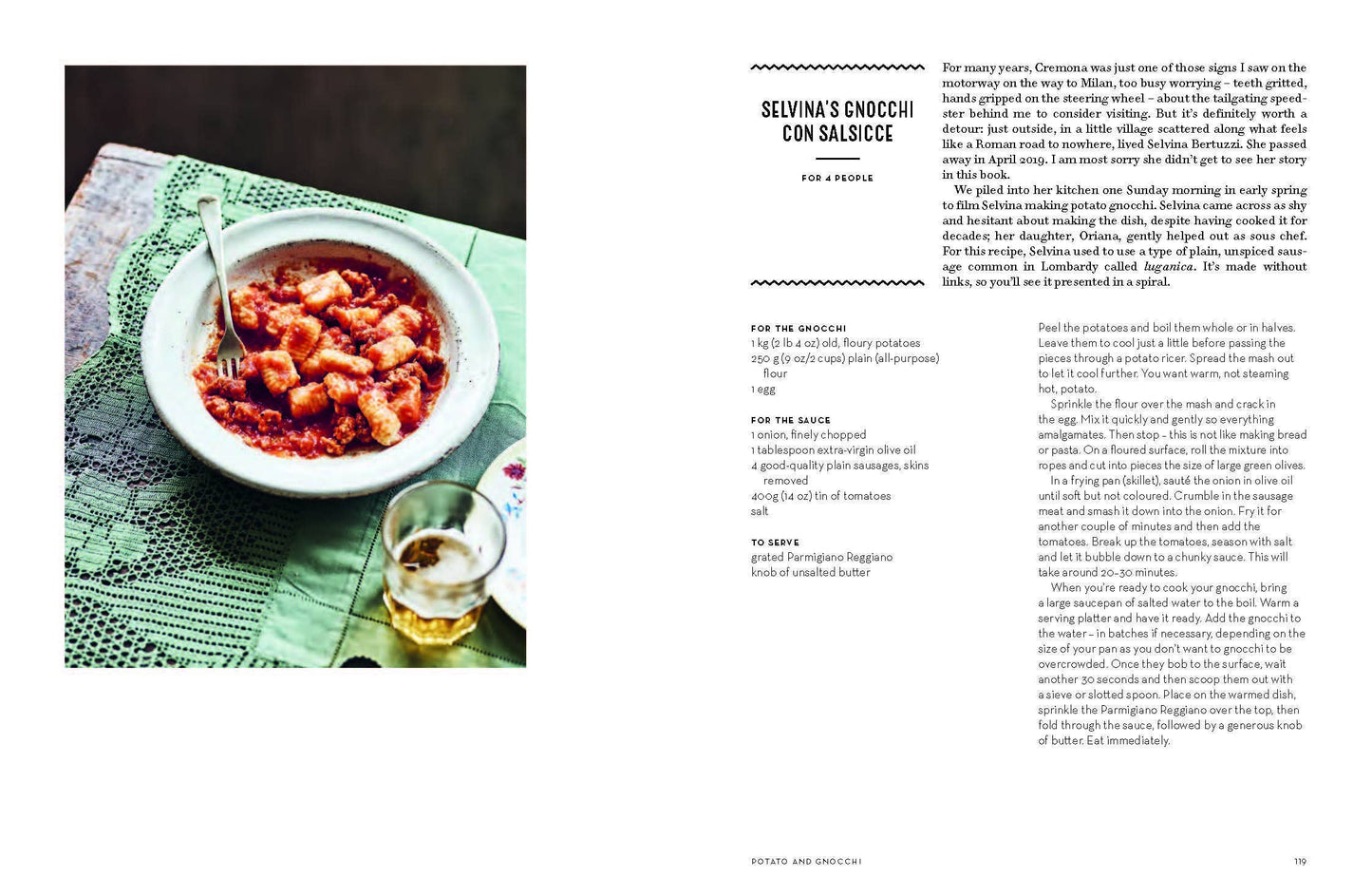 Recipe page with a bowl of pasta and a glass of wine on a green tablecloth.