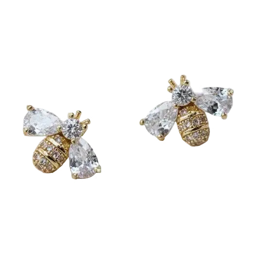 Gold bee-shaped earrings with clear gemstones on a white background