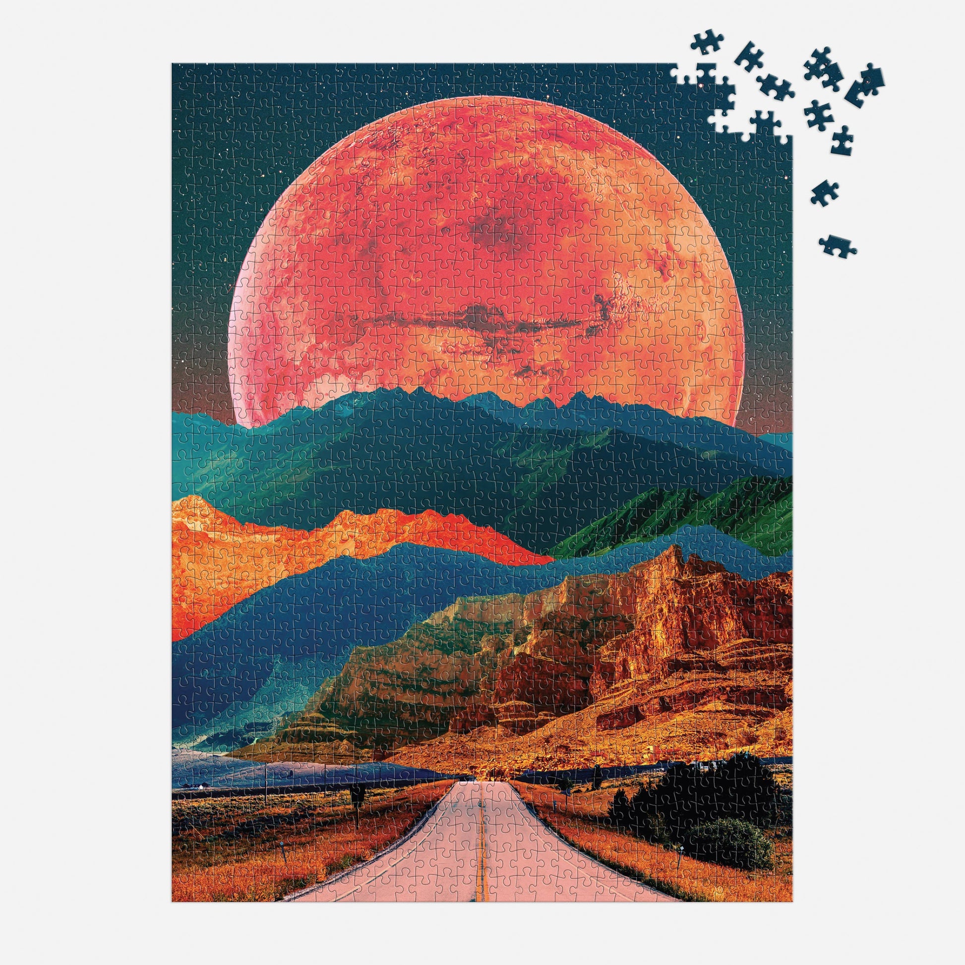 Jigsaw puzzle with a space-themed landscape featuring a large red planet and mountainous terrain.