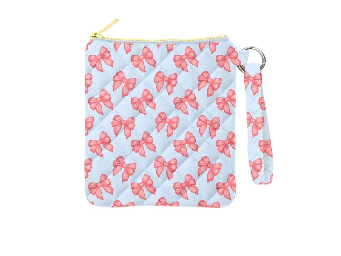 Pouch with pink bow pattern on a light blue background