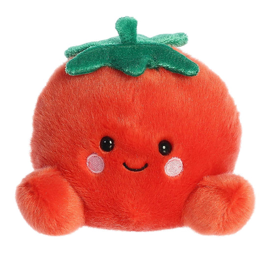 Plush toy tomato with a smiling face on a white background