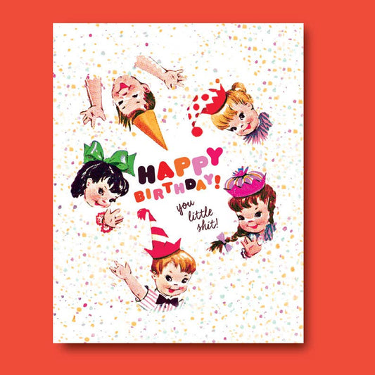 Birthday card with illustrated children and colorful text on a white background