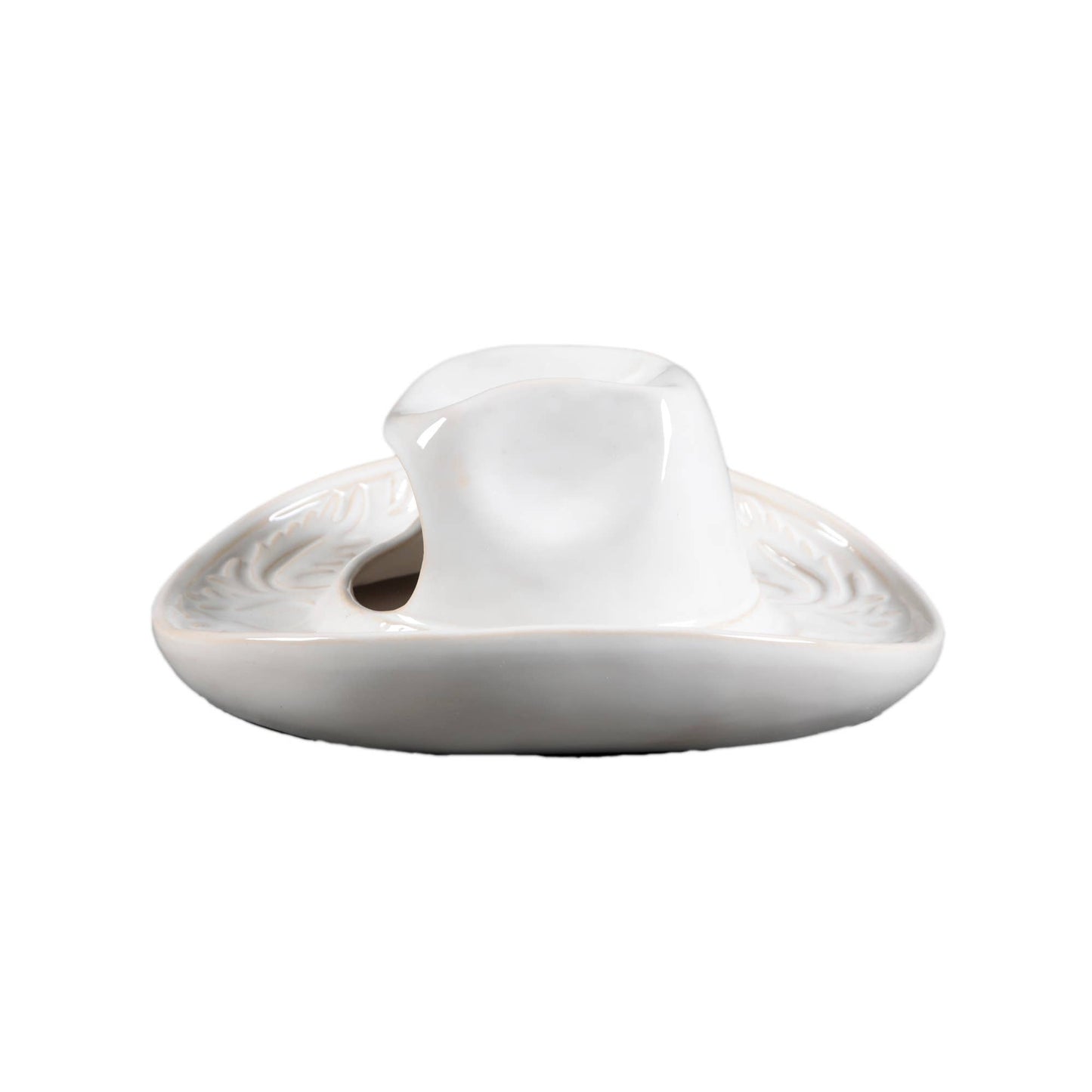 Side view of white ceramic cowboy hat shaped vase on a white background